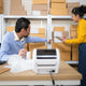 Two employees managing the stock