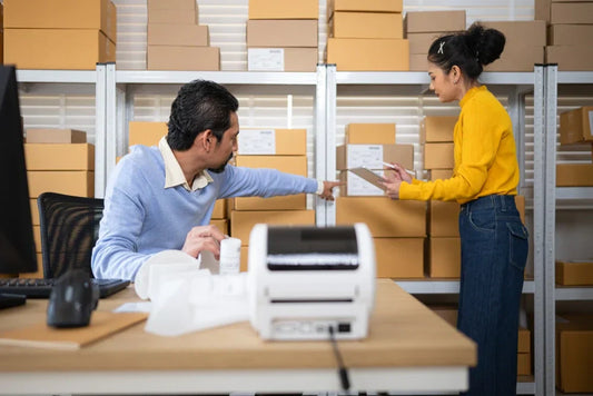 Two employees managing the stock